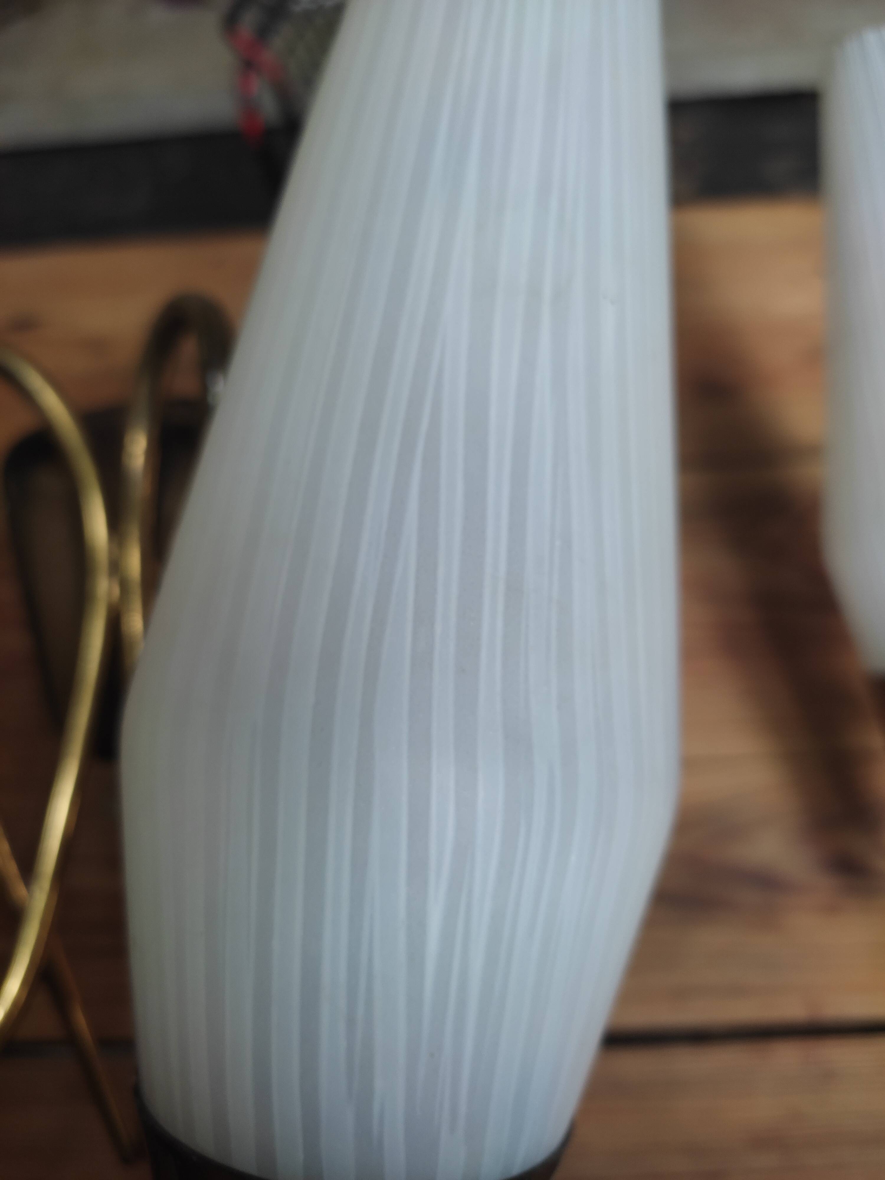 Duo of double appliques in brass and opalines