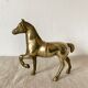 Cheval en laiton doré