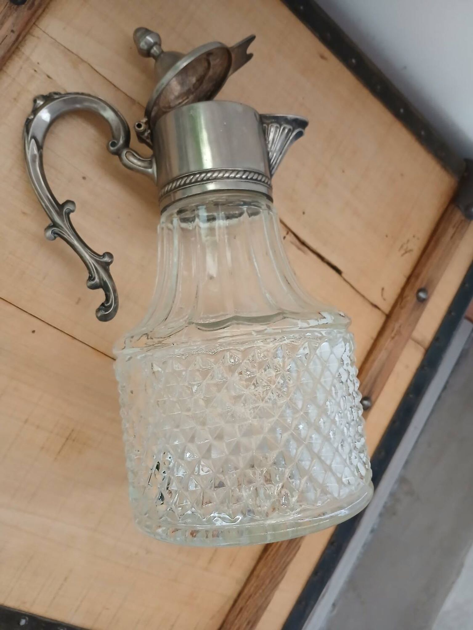 Antique pewter and glass carafe