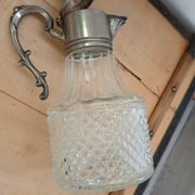 Antique pewter and glass carafe