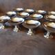 Set of 12 stainless steel footed bowls
