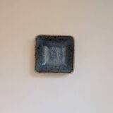 Stoneware pocket emptier