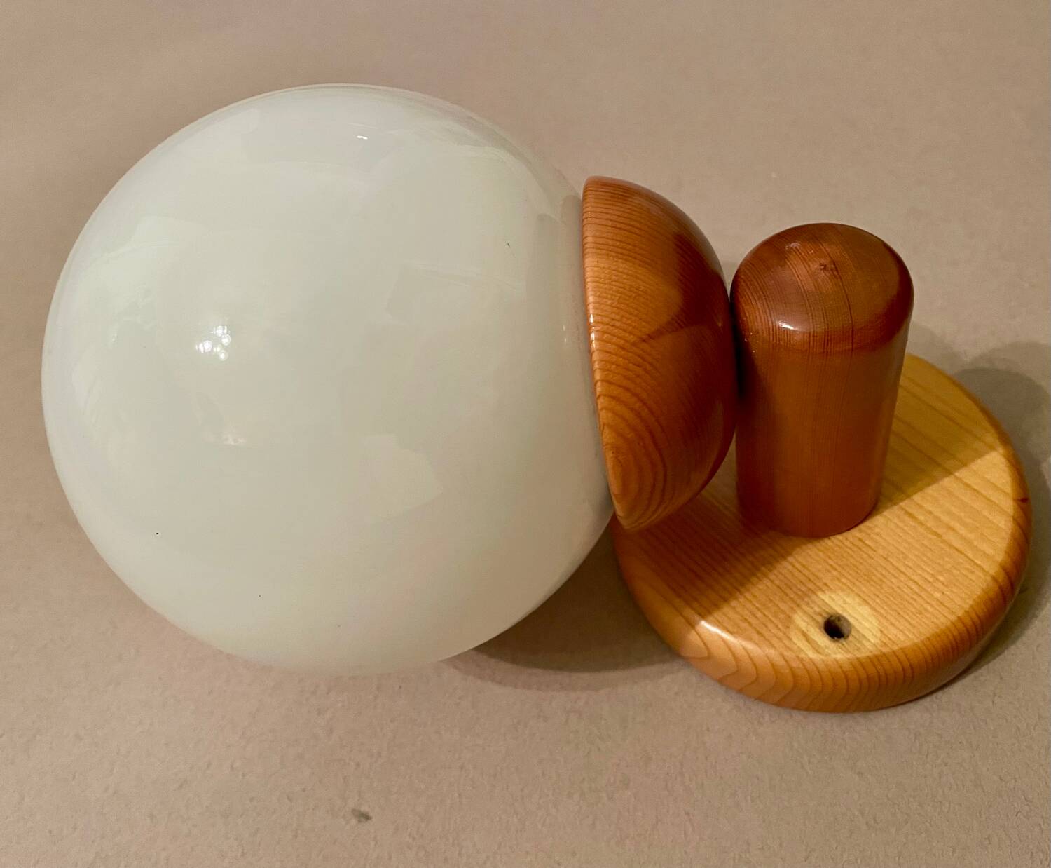 Vintage white glass wall light and pin.