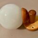 Vintage white glass wall light and pin.