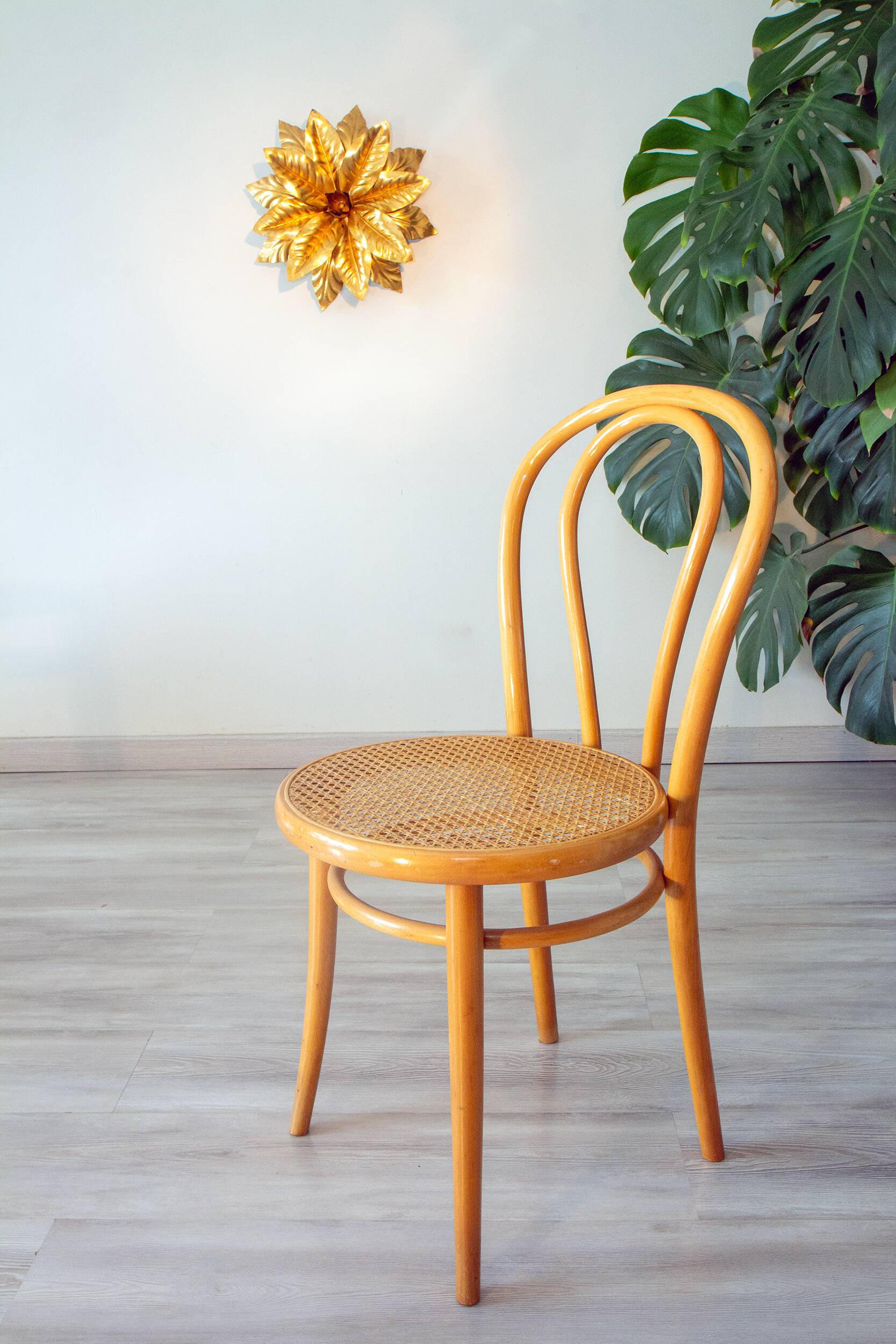 Pair of 1970s bistro chairs in bentwood and caning.