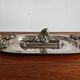 Silver serving dish by Franco Lapini with boar sculpture.