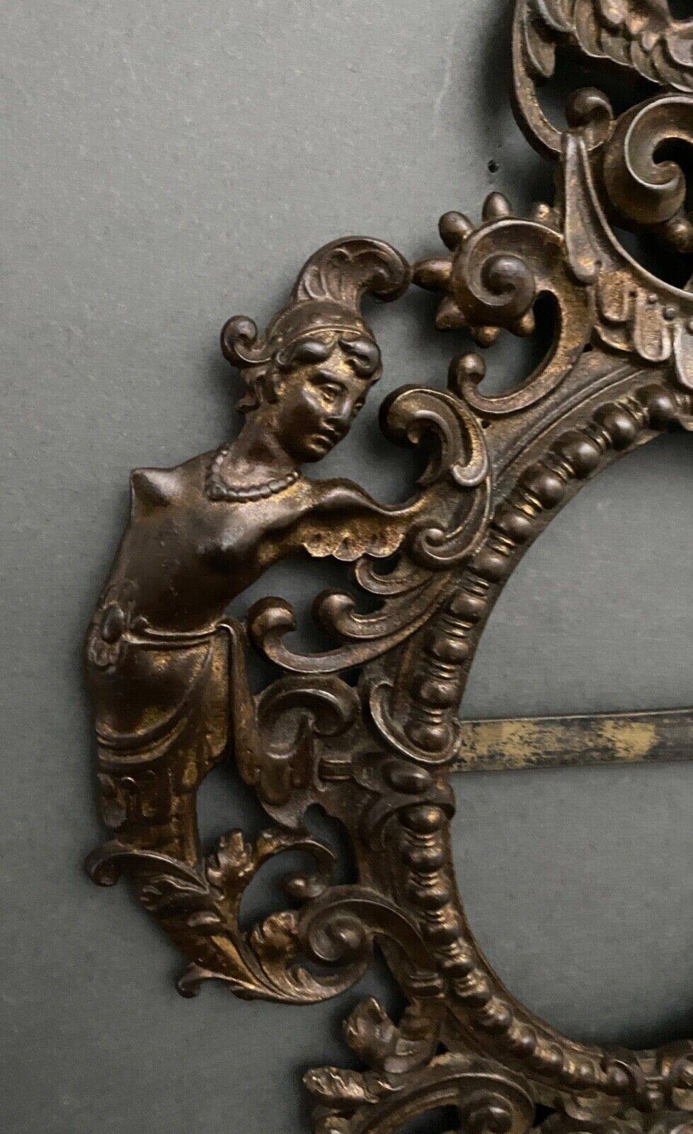 Bronze frame nineteenth Napoleon III richly decorated with macaroons