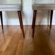 Pair of vintage mahogany and skai chairs