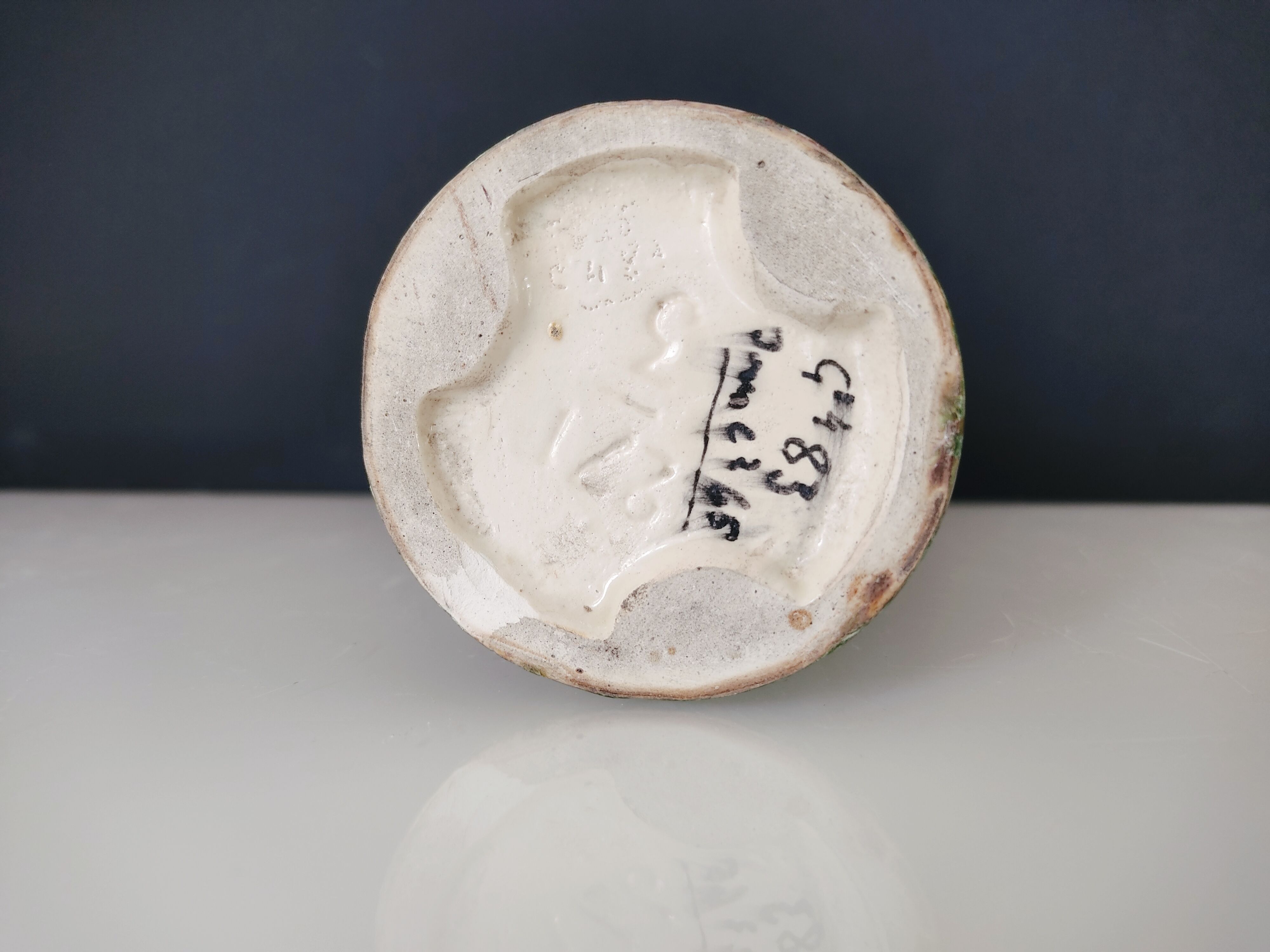 Pale green ceramic roller vase