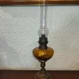 Antique kerosene lamp with yellow glass
