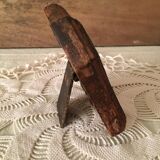 Photo frame in worked wood.