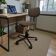 Brown vintage office chair from the 70s on wheels.