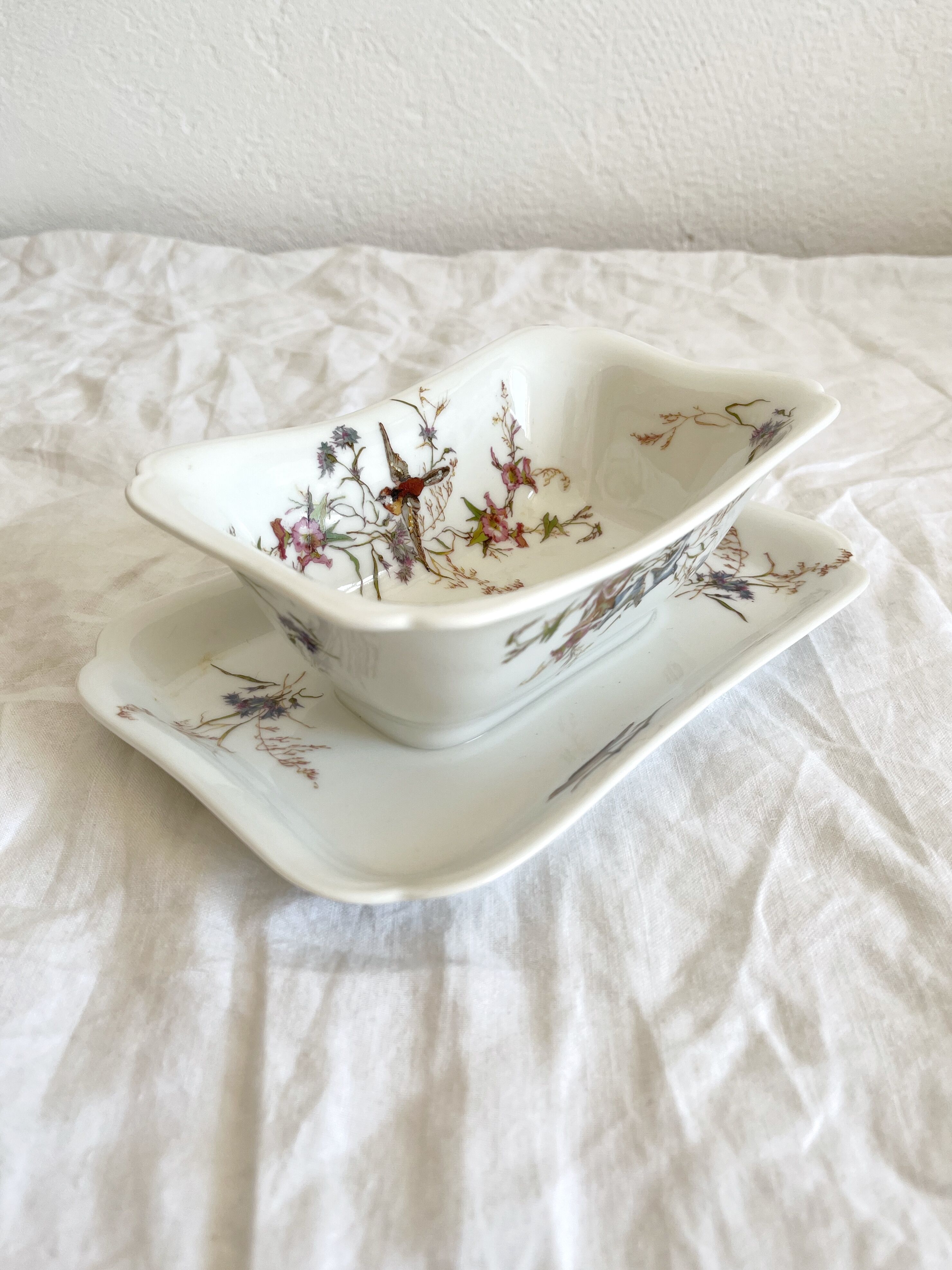 Rectangular sauce boat in Haviland Limoges porcelain with bird decoration