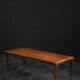 Classic vintage mid-century Scandinavian rosewood coffee table with a sliding black top.