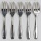 10 Christofle Alfénide Saigon model dessert forks in silver-plated metal.