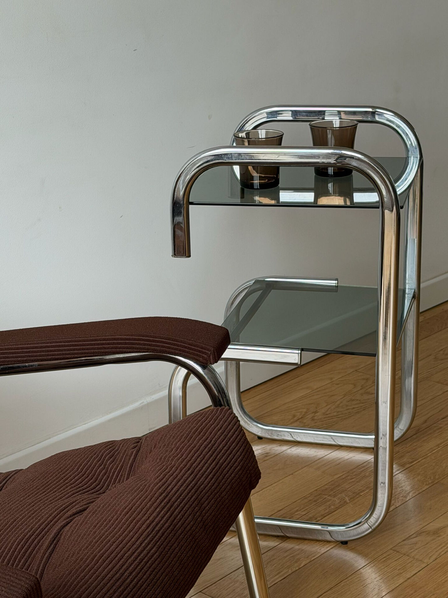 Vintage side table in smoked glass and chrome