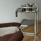 Vintage side table in smoked glass and chrome