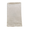 White sheet in monogrammed linen