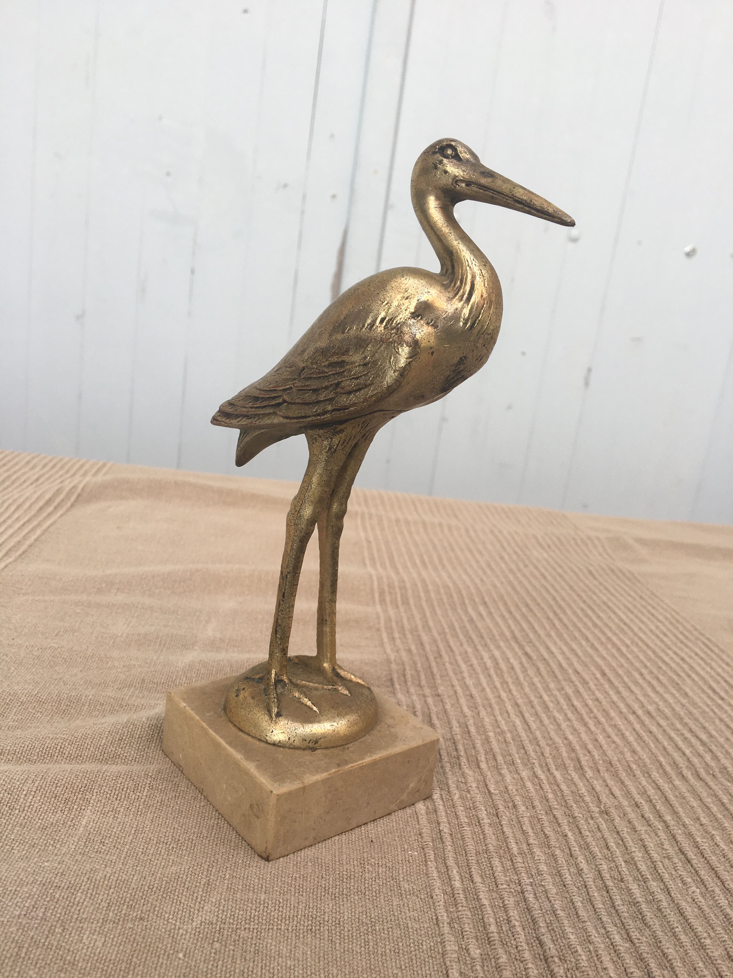 Heron brass statuette