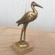 Heron brass statuette