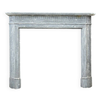 Cheminée demi-lune de style Louis XVI en marbre bleu turquin vers 1900