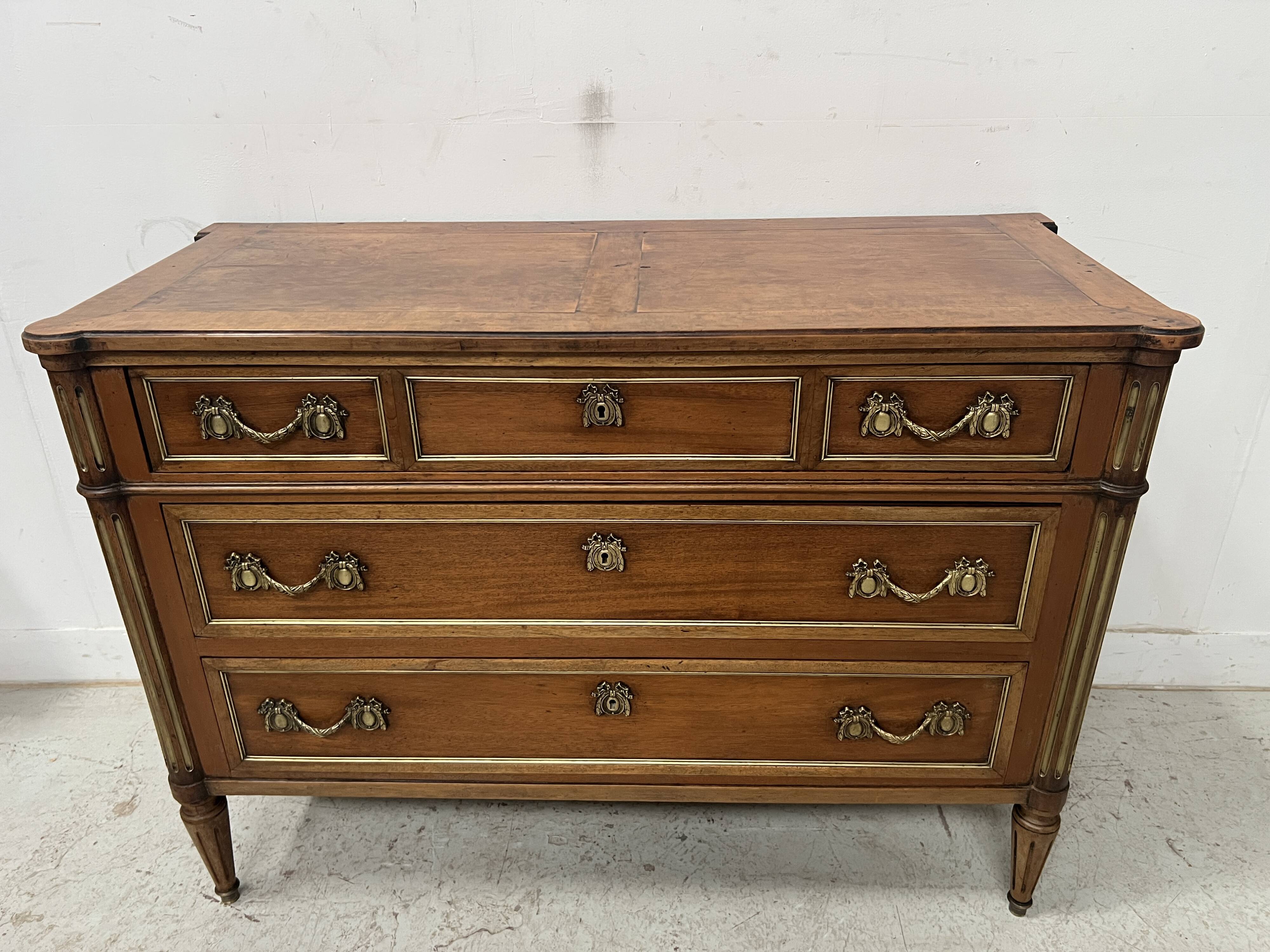 Louis XVI style mahogany commode with a grey veined marble top, 19th century