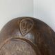 Vintage African tidy in natural wood with carved decoration in flat masks