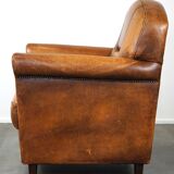 Charming and rugged sheepskin leather armchair, large model
