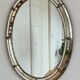 Vintage Spanish Venetian-style wall mirror, oval, brass, 1980s Hollywood Regency