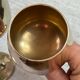 Green stemmed, brass chalices