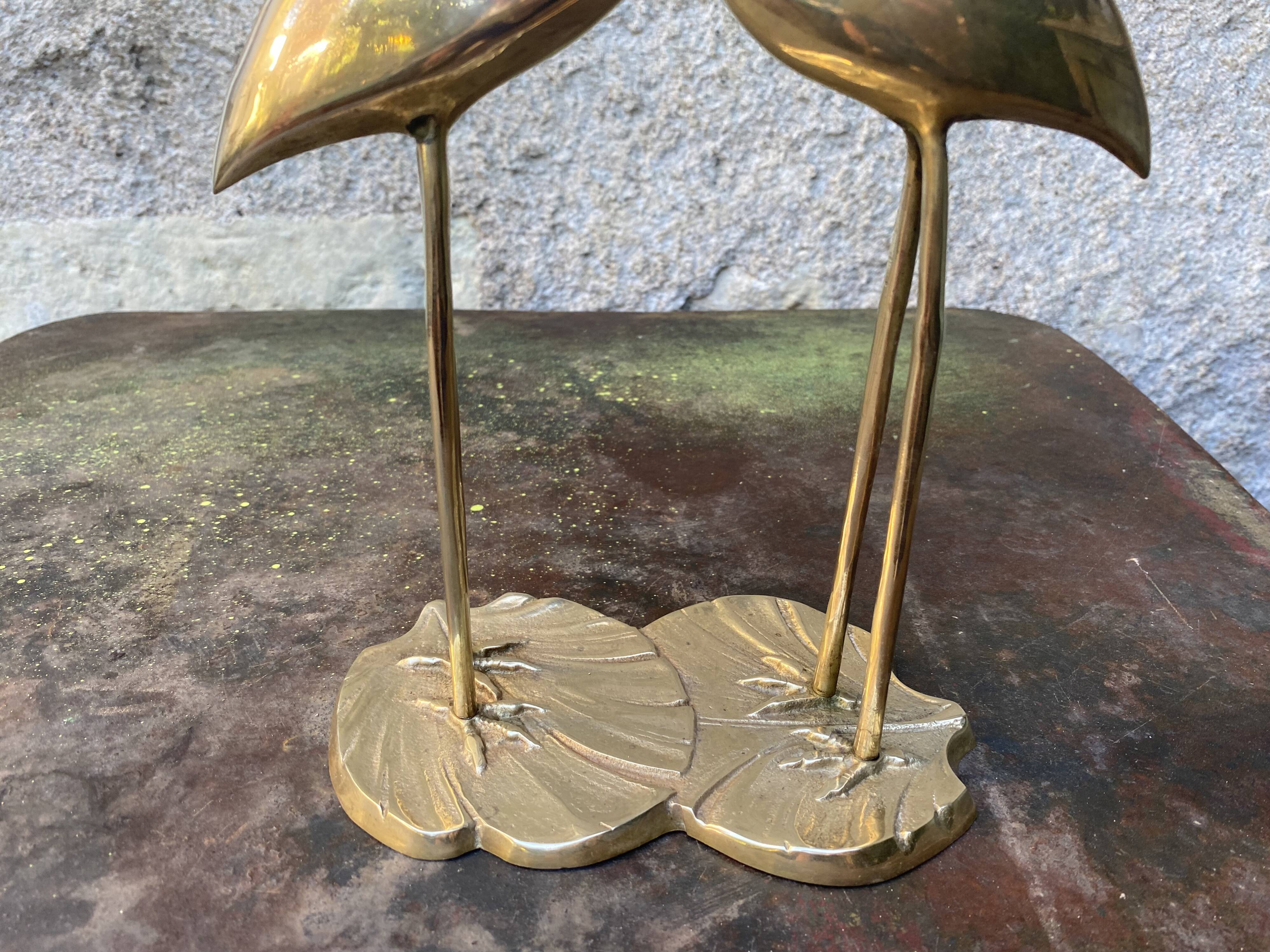 Couple of brass herons