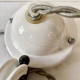 Suspension rises and falls in white glazed ceramic by The French House.