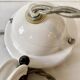 Suspension rises and falls in white glazed ceramic by The French House.