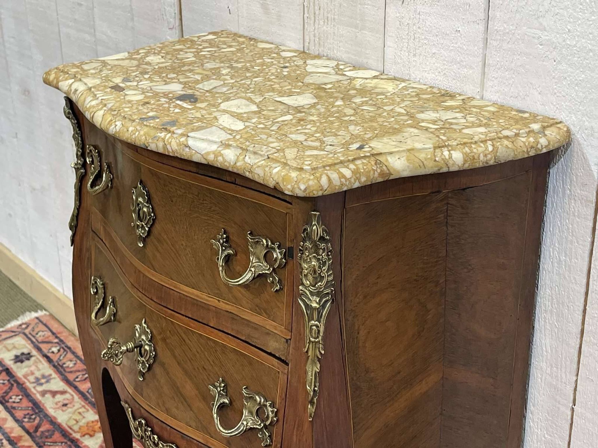 Late 19th-century Louis XV commode in oak, rosewood, and marble top