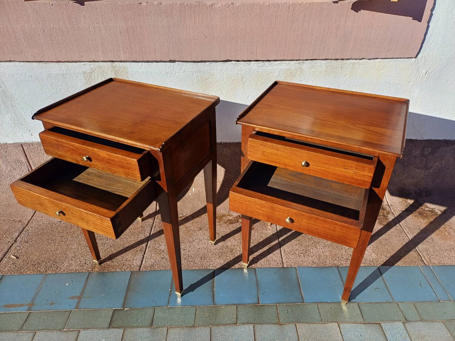 Pair of Louis XVI style oak bedside tables with 2 drawers and spindle legs