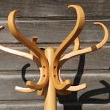 Simple baumann light parrot coat rack