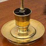 Compartmentalised brass candlestick