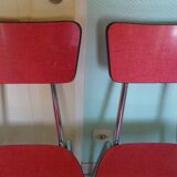 Table in red formica, 4 roc chairs, 2 extension cords, 2 drawers 60