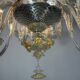 Venetian chandelier in gilded Murano glass, 24 light sources, three tiers, circa 1940.