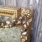 Wooden fireplace mirror and Gilded Louis XVI-style plaster with leaf