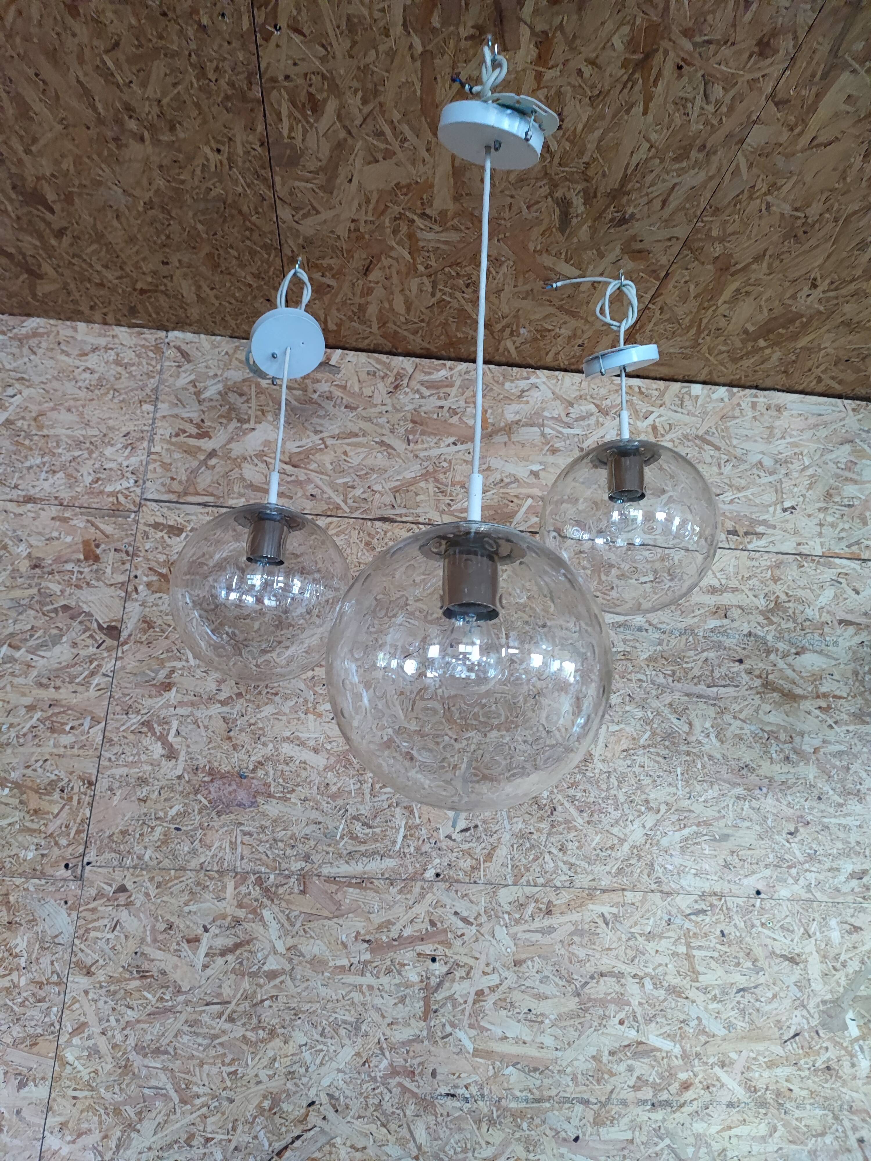 Bubbled glass globe pendant light. RAAK Amsterdam