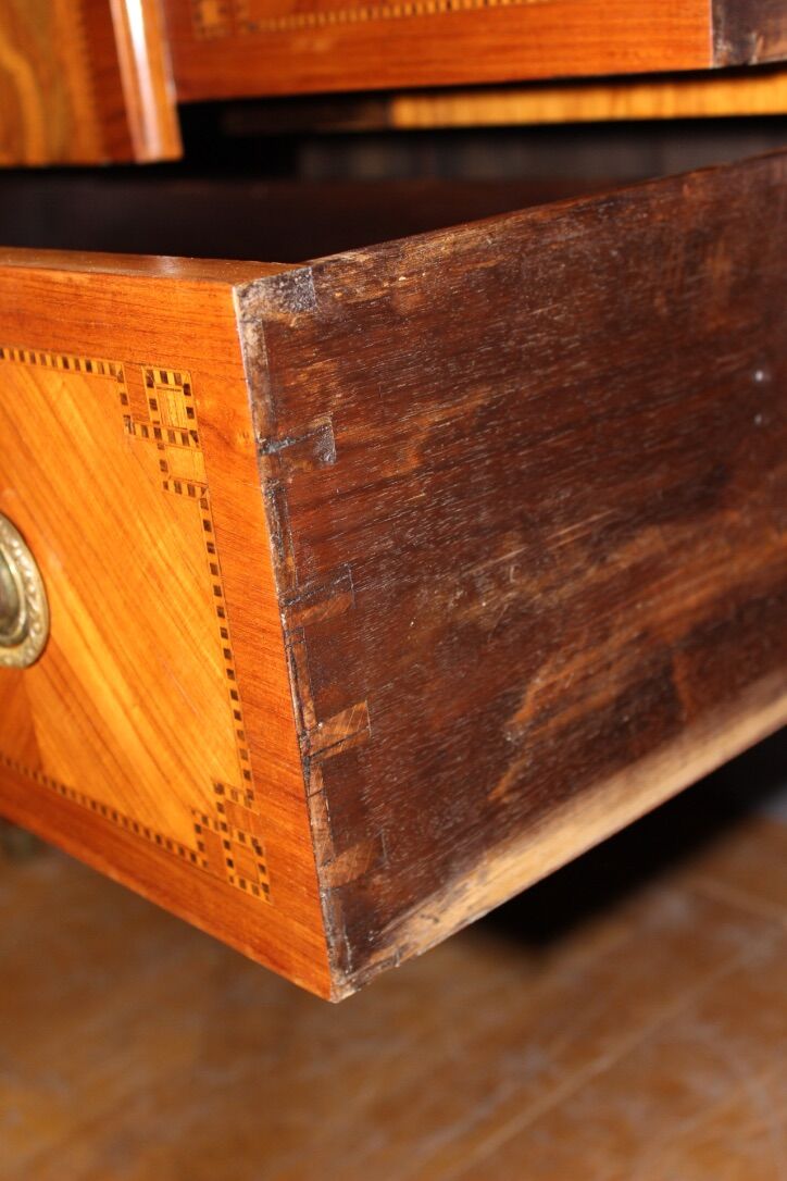 Louis XVI style chest of drawers with music attributes