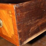 Louis XVI style chest of drawers with music attributes