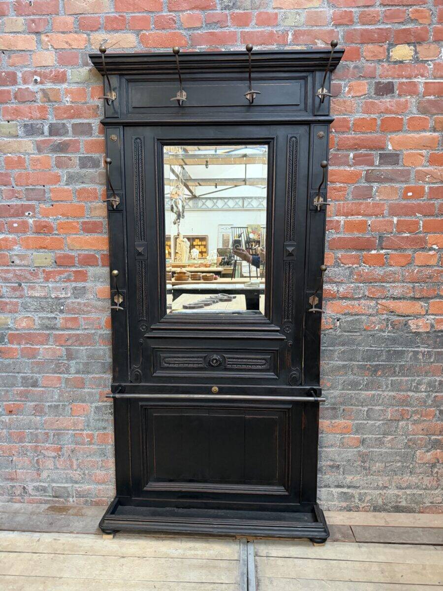 Patinated oak wardrobe from the early 20th century.