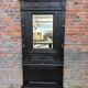Patinated oak wardrobe from the early 20th century.