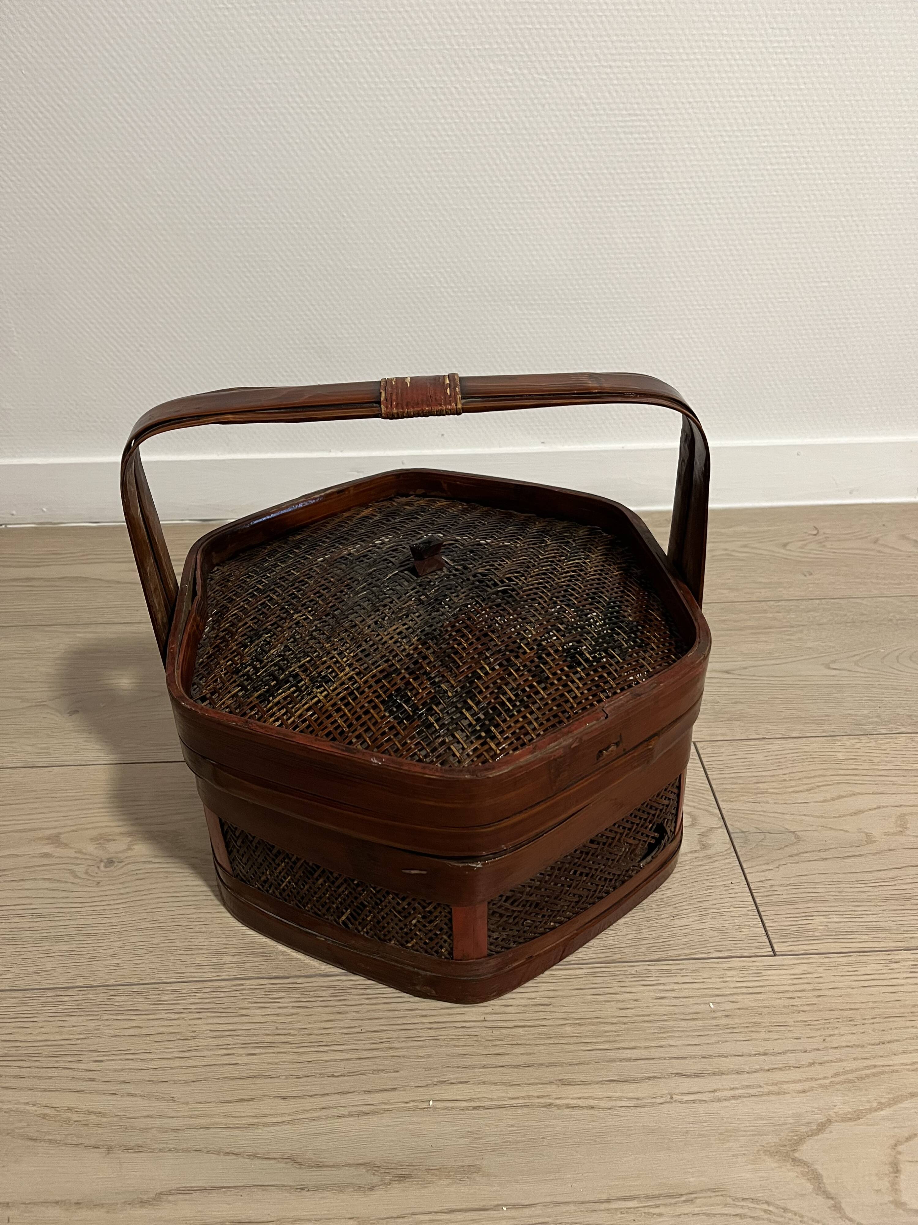 Ancient wooden and woven wicker basket,