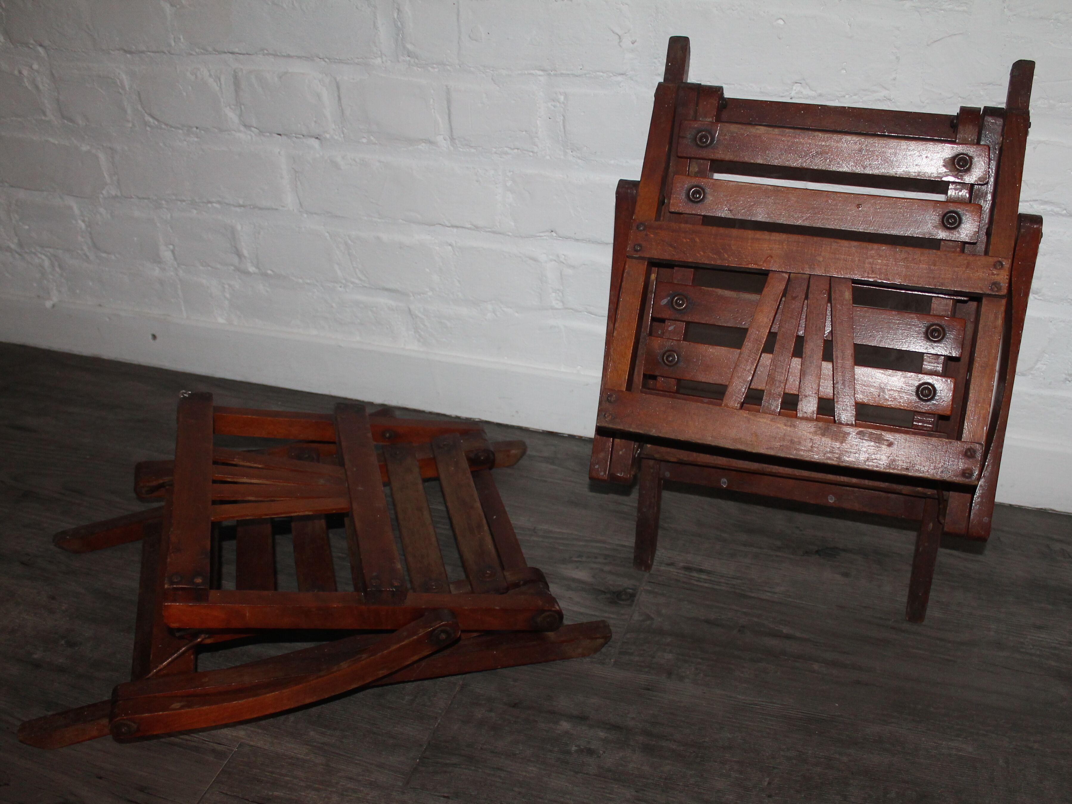 2 wooden folding chairs