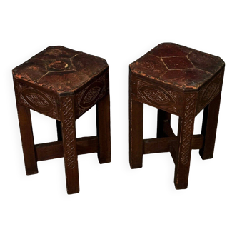 Pair of oriental stools covered in leather mid-20th century engraved wood