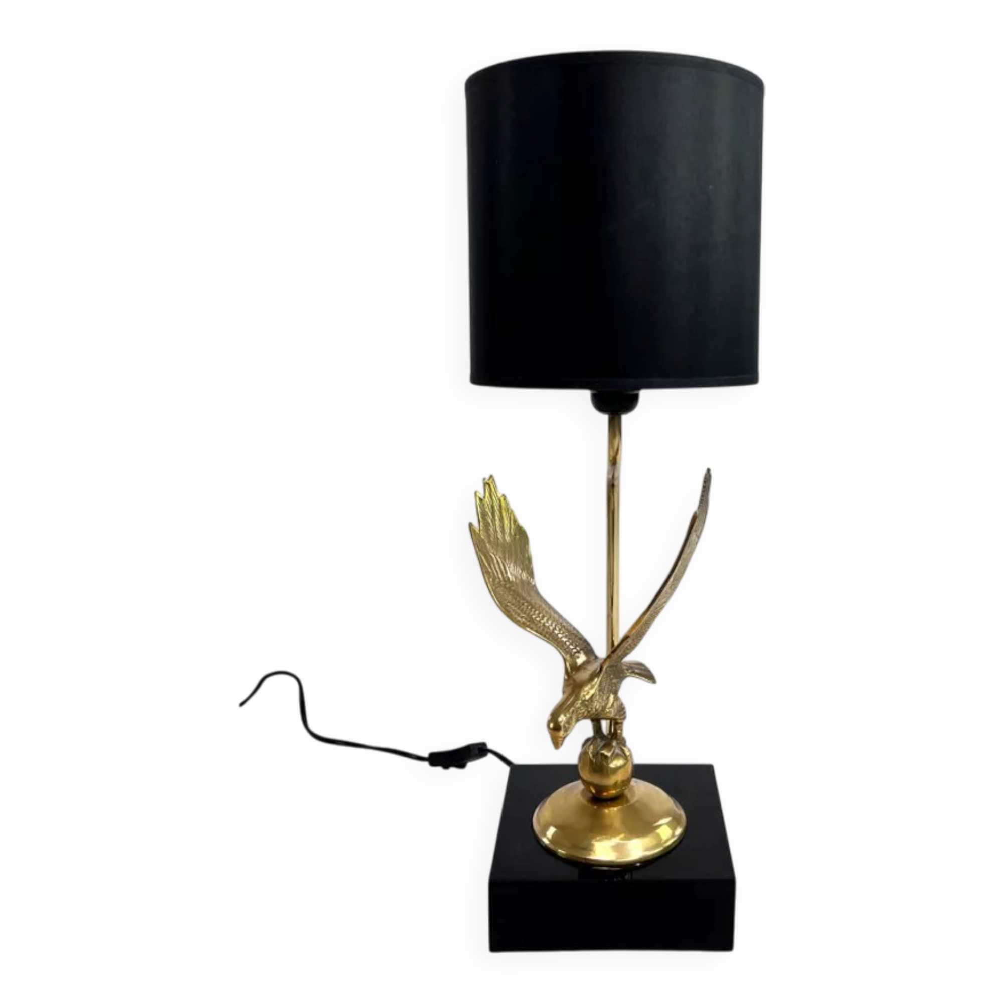 Brass lamp on black lacquered wooden base
