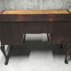 Old desk in cherry and green leather